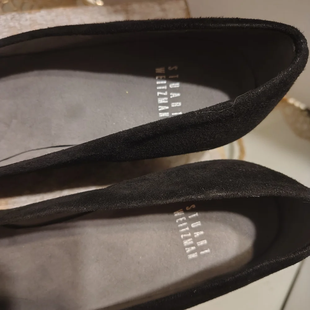 Stuart Weitzman Black Flats with Silver Accent